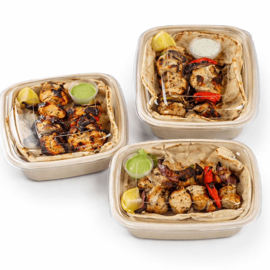 Three SKEWERBROS meal prep containers with grilled chicken skewers